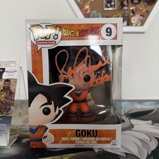 DBZ Goku 9. Signed Sean Schemmel. (2018). JSA. Ships in Hard Stack.