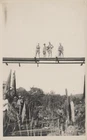 US MILITARY SOLDIERS ON CRUDE BRIDGE IN FOREIGN LAND POSTCARD 1910s RPPC WW1 ERA