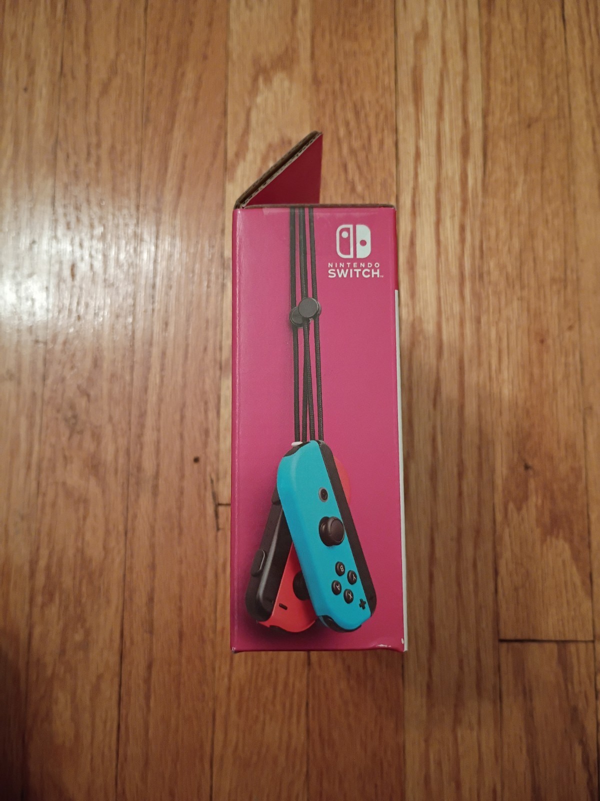 Nintendo Switch Joy Cons Neon Red (left) & Neon Blue (right)