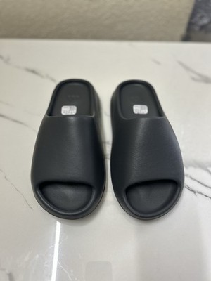 Brand New Yeezy Slides Granite Size 7 (Men's) never worn.There In Good Condition