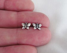 Sterling Silver 7mm Butterfly post stud earrings.
