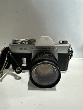 Mamiya/Sekor 1000 DTL 35mm SLR film camera with an Auto Mamiya/Sekor 52mm