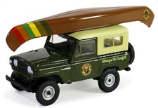 GREENLIGHT,NISSAN Patrol 1980 mit Kanu auf dem Dach aus der SMOKEY BEAR-Serie...