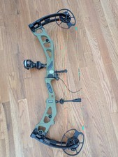 Elite Carbon Era RH 65# Green USED (fair condition)