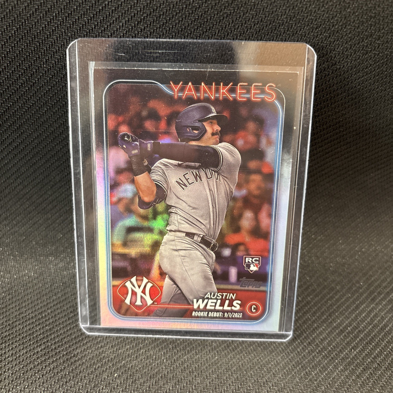 2024 Topps Update Series - Rookie Debut Austin Wells #US325 Rainbow Foil (RC)