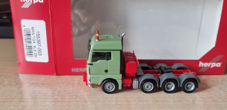 Herpa 313520 MAN TGX GX trattore pesante neutro rosso 8X4 1:87 OVP - Immagine 2 di 4