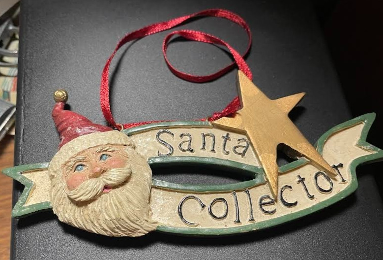 Ceramic Santa Collector Ornament 6" long - 2 1/2" in Height, Santa Face w/ Star