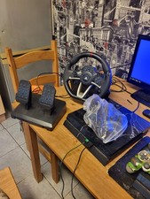 Ps4 Slim Console 1TB With 2 Controllers, Docking Station And A Steering Wheel