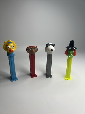 Vintage PEZ Süßigkeitenspender 4er Set Simpsons Star Wars Wicked Snoopy