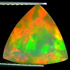 2.97 Ct IGI Certified Natural Ethiopian Faceted Opal Multi Color Trillion Cut — photo 1