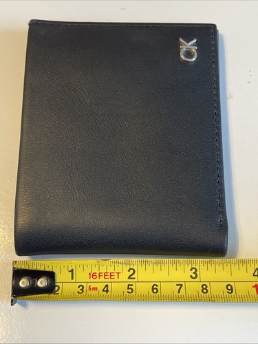 Cartera Calvin Klein Immaculate Gentleman’s de cuero negra plegable. - Imagen 9 de 17