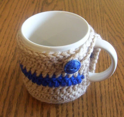 Hand Crochet Tan and Blue Buttoned Coffee Mug Cozy - Image 1 of 3
