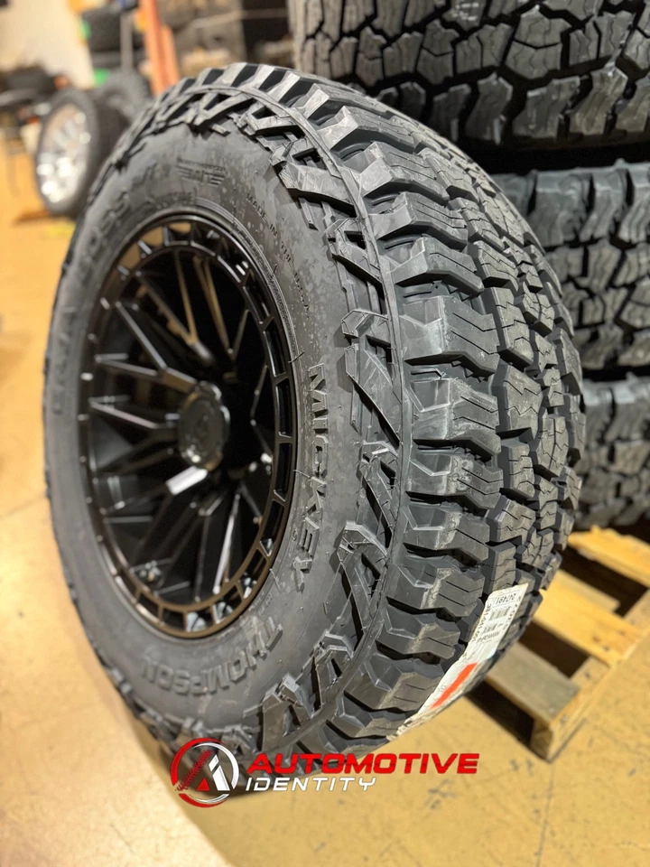 Ruedas negras Arena Battle 20x10 neumáticos Baja AT 37" 6x135 Ford F150 Raptor SVT Foto 3 de 4