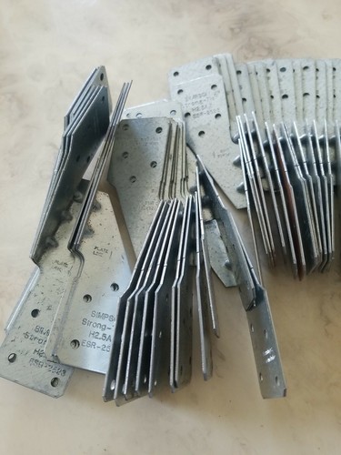 30x.  Simpson Strong H2.5AZ, Hurricane Tie Z-Max, for rafters.