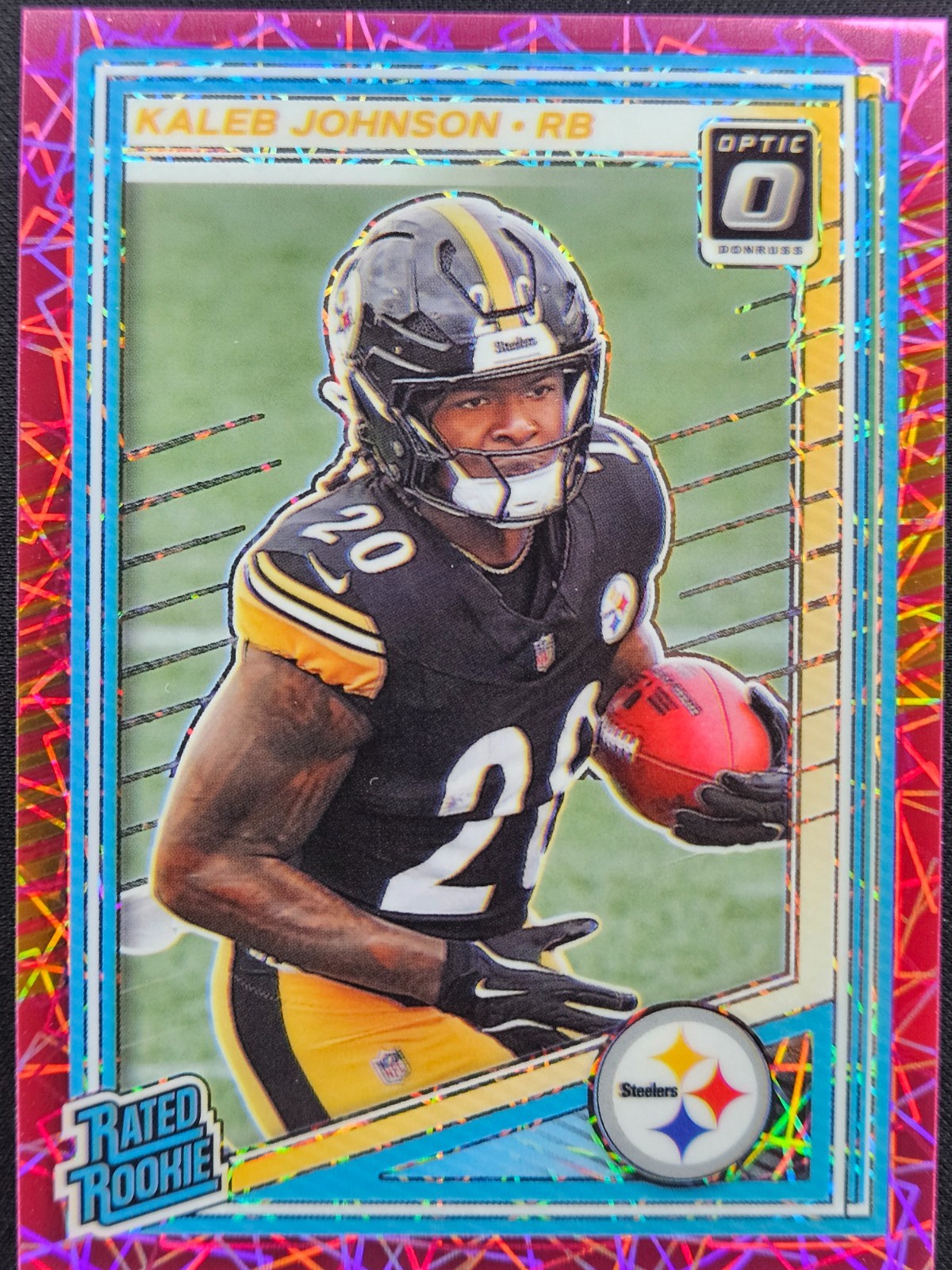 2025 Panini Optic - Rated Rookie Kaleb Johnson #232 Pink Velocity /99 (RC)