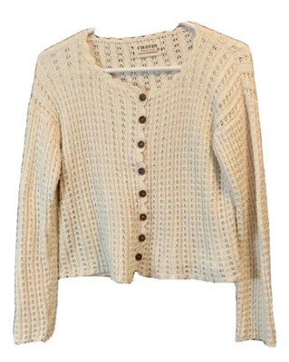cream colored cardigan