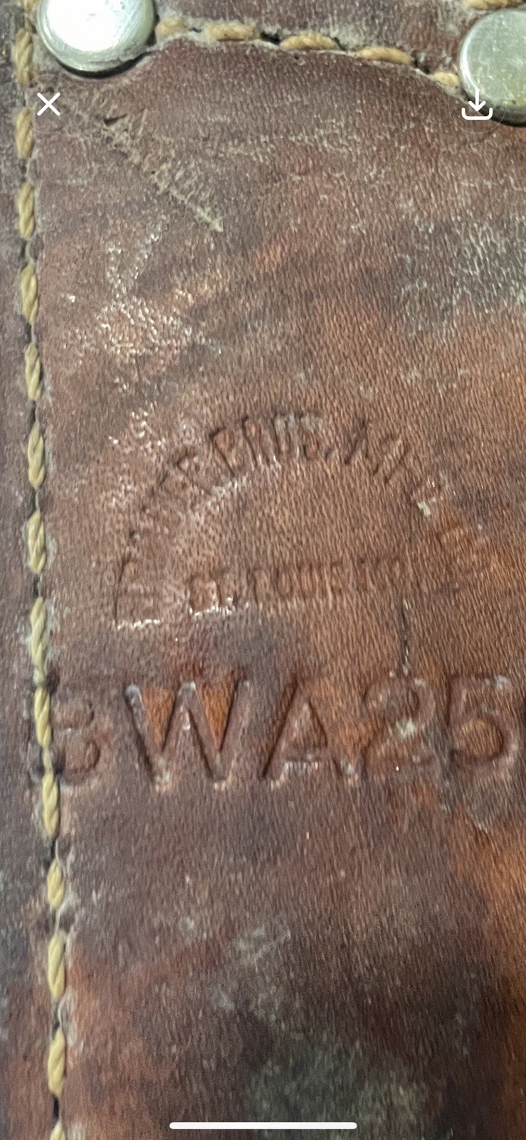 Brown leather Bauer Bros WA250 gun holster with visible stitching and engraved oval branding on front panel.