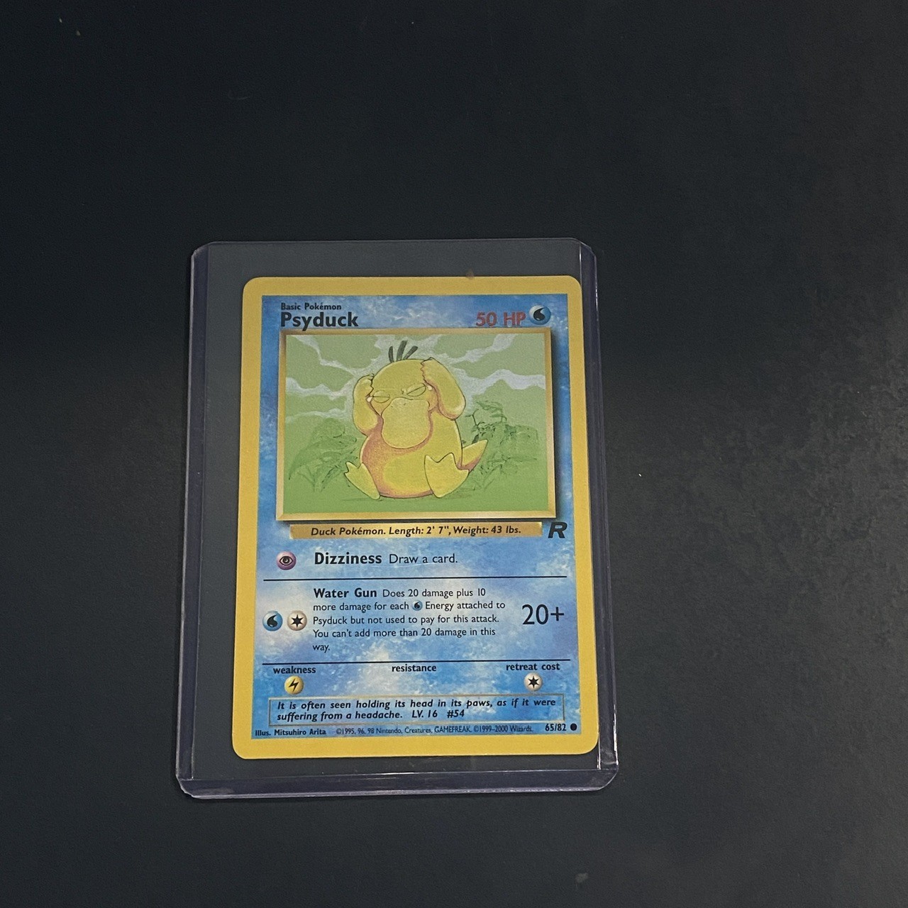 Pokemon Card - Team Rocket Psyduck 65/82 WOTC - NM - - - Common