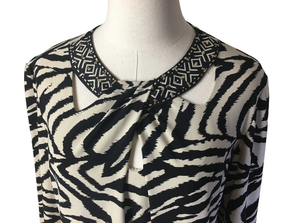Top túnica Joseph Ribkoff talla 12 negro beige dorado detalles en cuello y mangas Foto 3 de 4