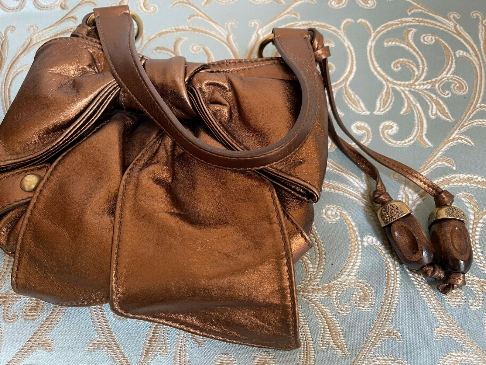 Yves Saint Laurent Borsa a mano vintage a nastro oro donna con due ghiande