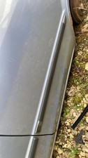 Baguette de porte Mazda 323