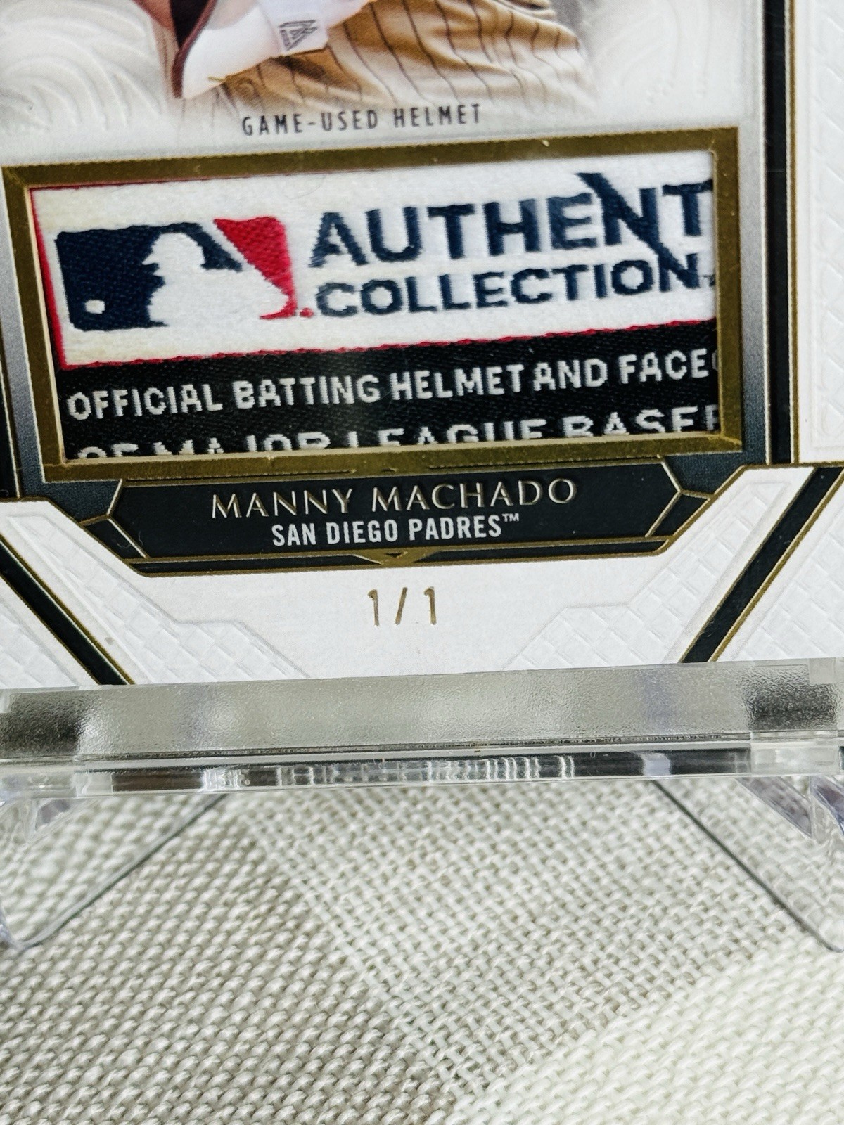 Topps 2025 Definitive Manny Machado Game Used Helmet LOGOMAN 1/1 Tag Patch view 2