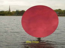 Photo 12x8 Red Sky Mirror in the Round Pond Paddington Part of the Anish K c2010