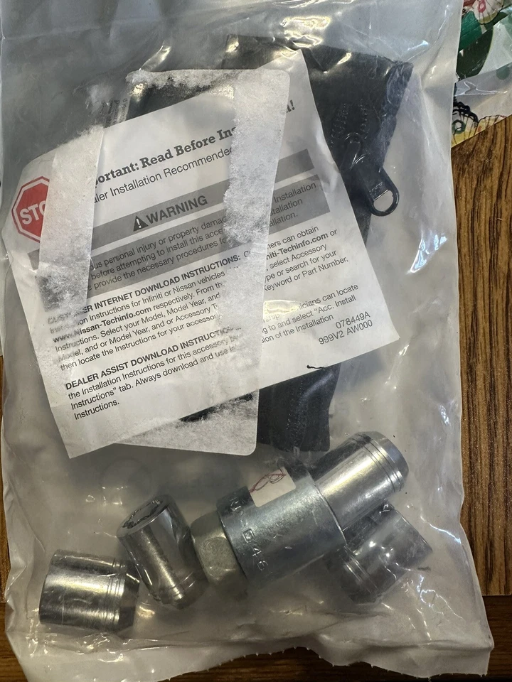 Nuevas tuercas originales OEM de fábrica Nissan T99W2 A7010 selladas en bolsa Foto 2 de 2