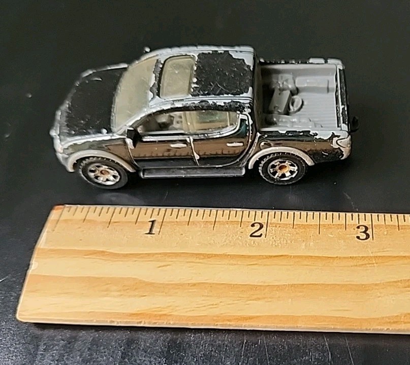 2009 Matchbox Black Mitsubishi L200 Triton Clear Windows Mattel | eBay