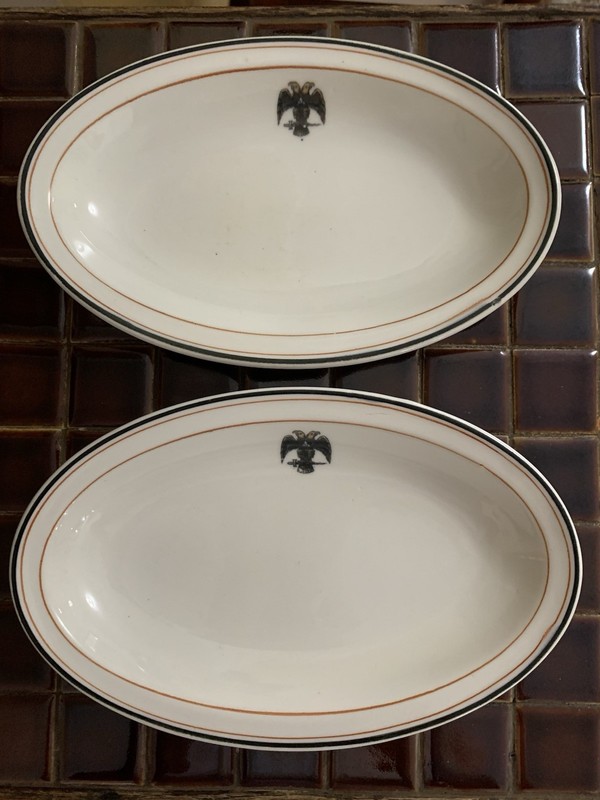 WARWICK Restaurant Style Oval Dinner Platters, Ivory W/ Orange & Black Border.