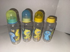 4 Sesame Street Beginnings Baby Bottles Cookie Monster Babies Big Bird