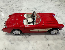 General Motors 1957 Chevrolet Corvette Redwhite Diecast Model Car Opening Doors General Motors 1957 Chevrolet Corvette Redwhite Diecast Model Car Opening Doors