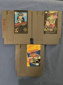 1985 NINTENDO NES  ORANGE ZAPPER GUN & LOT OF 3 GAMES. HOGAN&rsquo;S ALLEY, GOTCHA & 