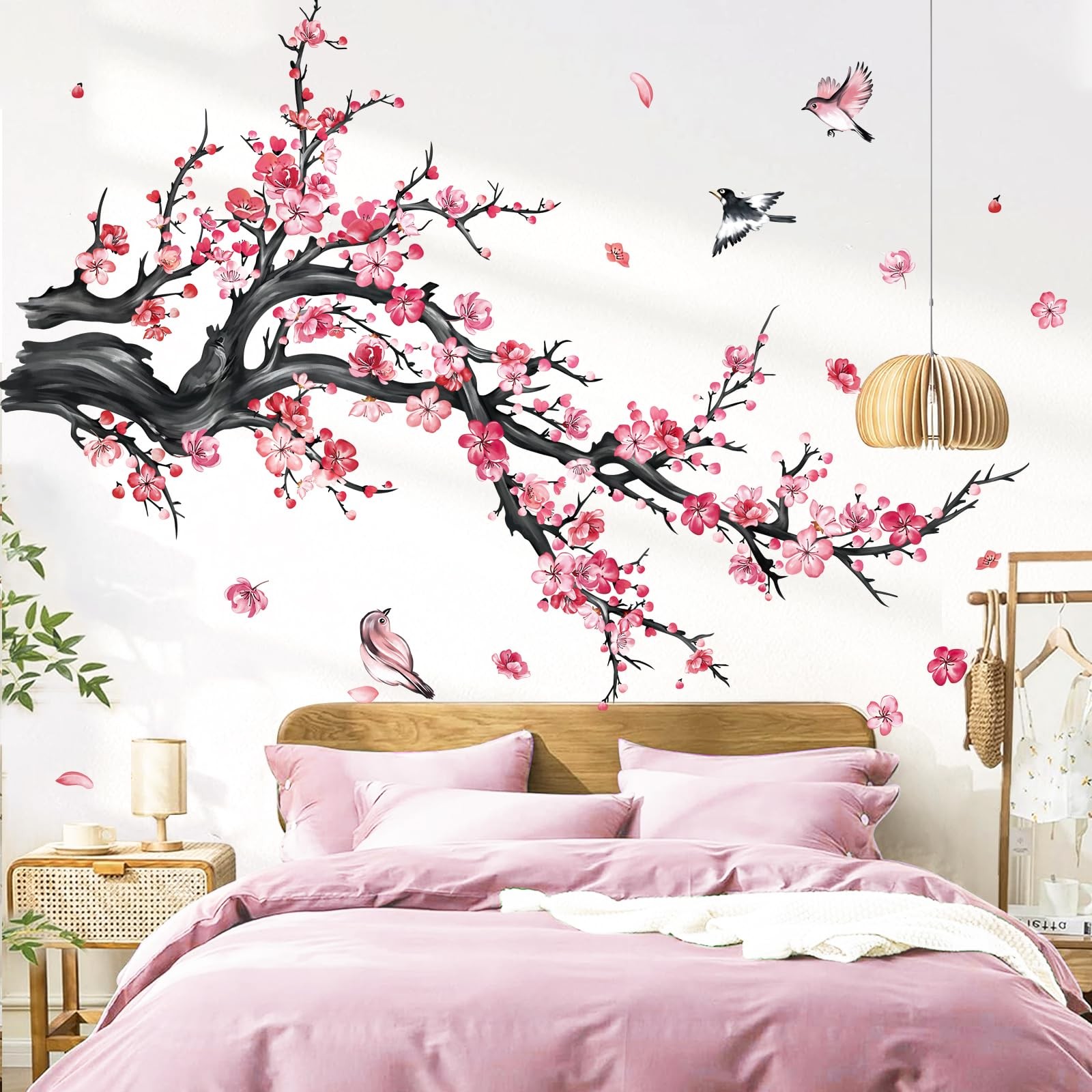 Stickers muraux branche de fleurs rose pour créer une ambiance zen chez soi