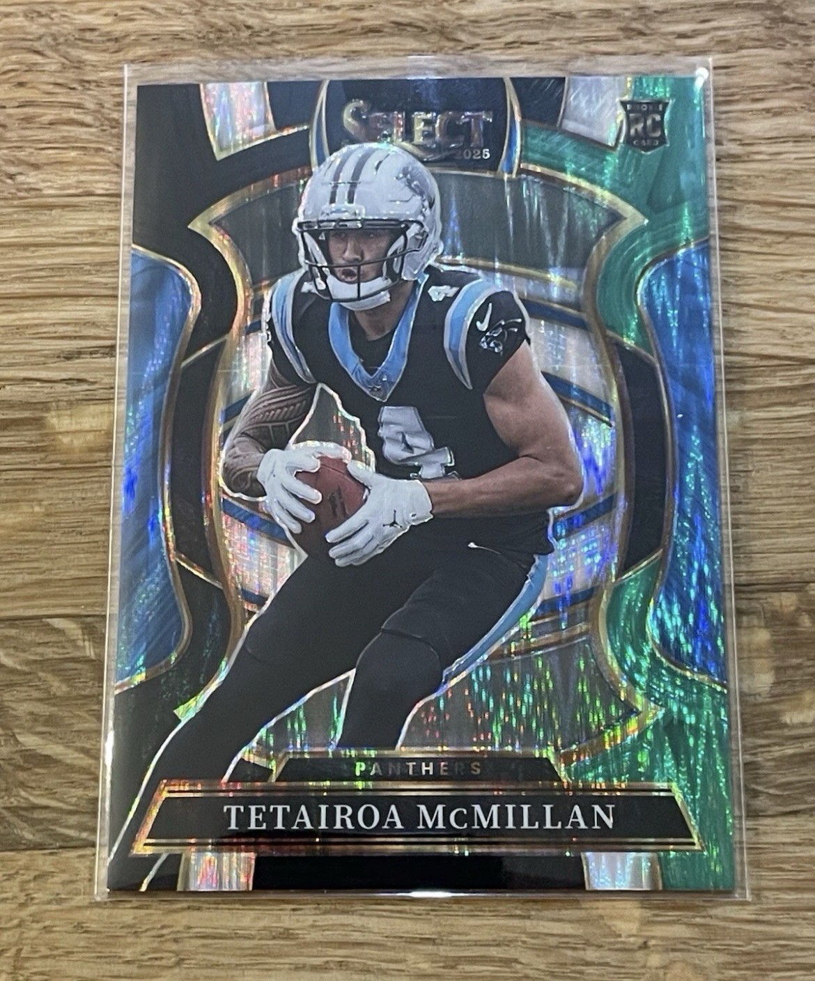 2025 Select - Concourse Tetairoa McMillan #44 Black & Green Shock Prizm (RC)