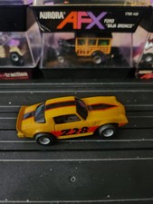 Tyco 6977 HP7 Z28 Camaro Yellow Black Orange HO Slot Car Nice