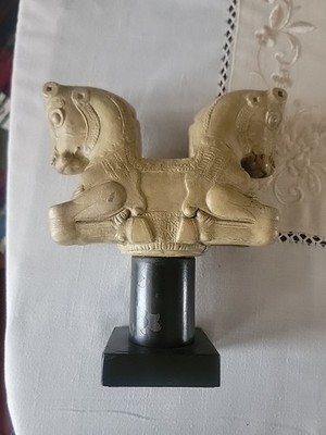 Replica of an ancient Assyrian relief with two horses. 