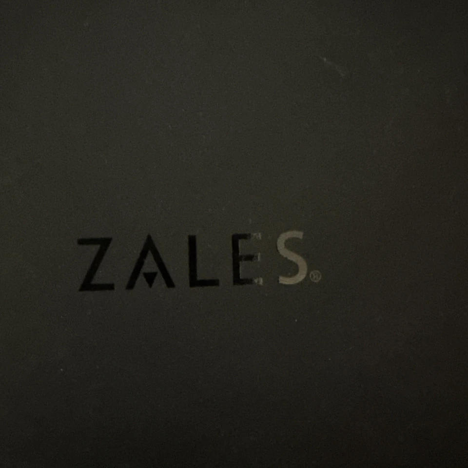 PULSERA BOLO DE PLATA ESTERLINA DOBLE INFINITO CON ACENTO DE DIAMANTES ZALE'S JEWELERS Foto 4 de 4