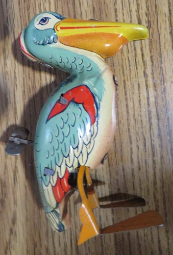 Vintage J. Chein Tin Litho Wind Up Mechanical Pelican No Chein Logo Shield