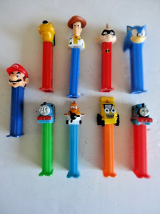 Nine Character PEZ Dispensers - Thomas The Train, Incredibles, Mario, Toy Story