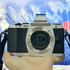 95 New Olympus OM-D E-M5 16.1MP Digital Camera Body Only English Silver.