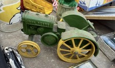 Vintage John Deere Cast Iron tractor/farm toy in classic green  yellow colors