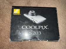 Nikon COOLPIX S203 10.0MP Digital Camera - Silver Battery Charger Box