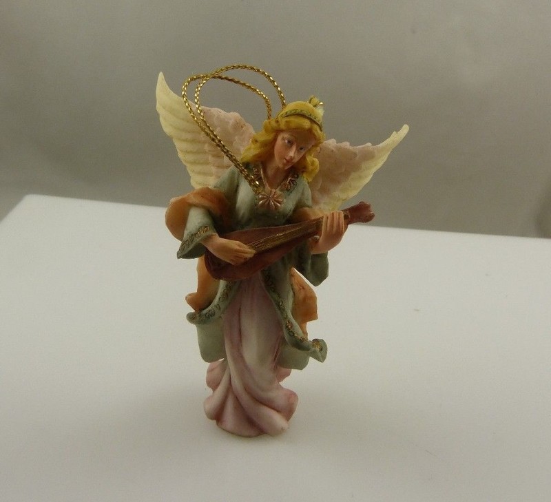 Angel holding a musical inst? plastic or resin  vintage  Christmas ornament xmas