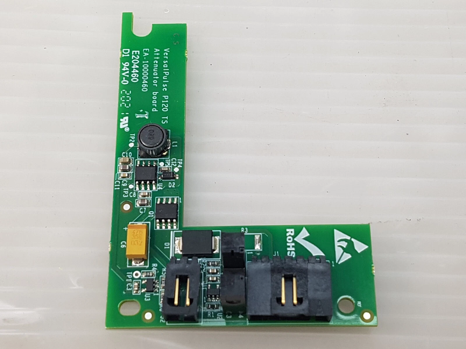 L-shaped Lumenis attenuator board EA-10000460 rotated, showing its right-angle headers