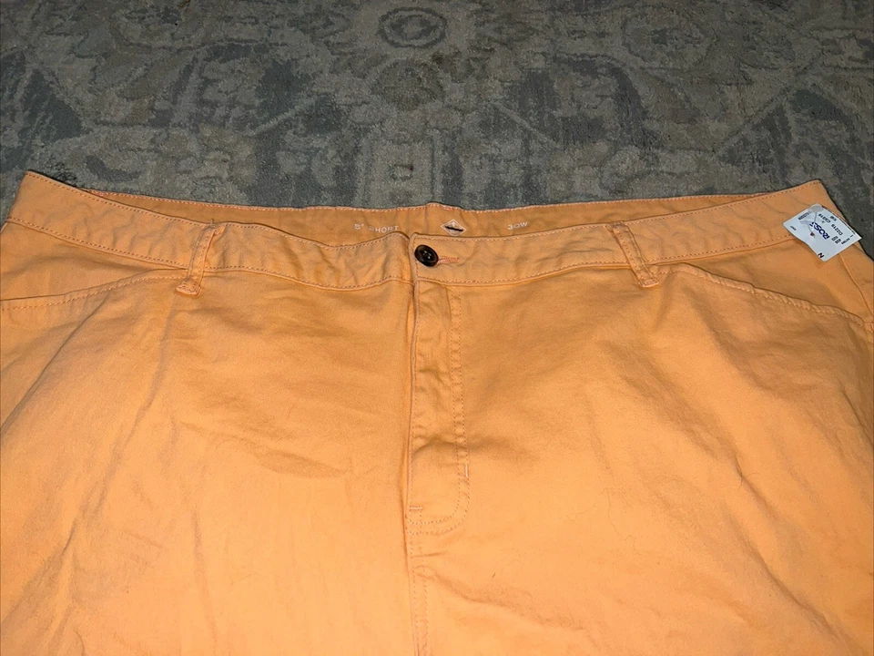 Pantalones cortos St. Johns Bay 5” para mujer talla grande 30W naranja frente plano Foto 2 de 4