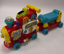 VTech 4-in-1 Alphabet Train Ride-On Toy with Sounds and Activities (#H1/03)
