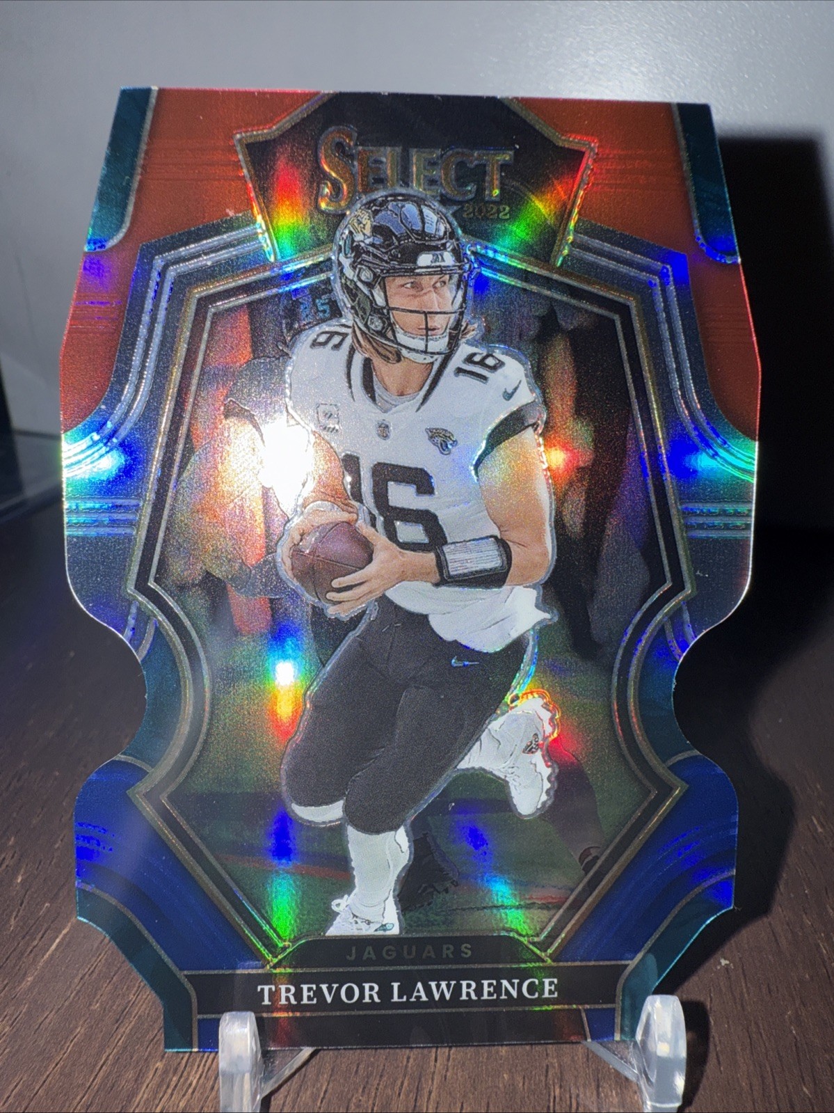 2022 Panini Select - Premier Level Trevor Lawrence #145 Red & Blue Prizm Die-Cut