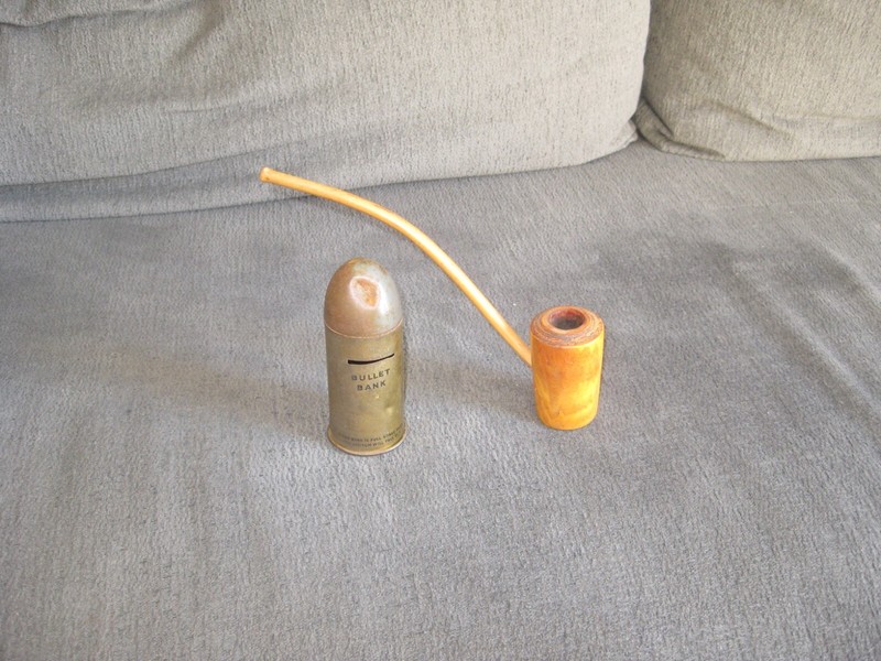 vintage bullet bank + vintage smoking pipe