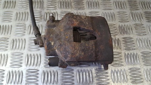 Bremssattel links vorne  Volkswagen Golf DE441099-64